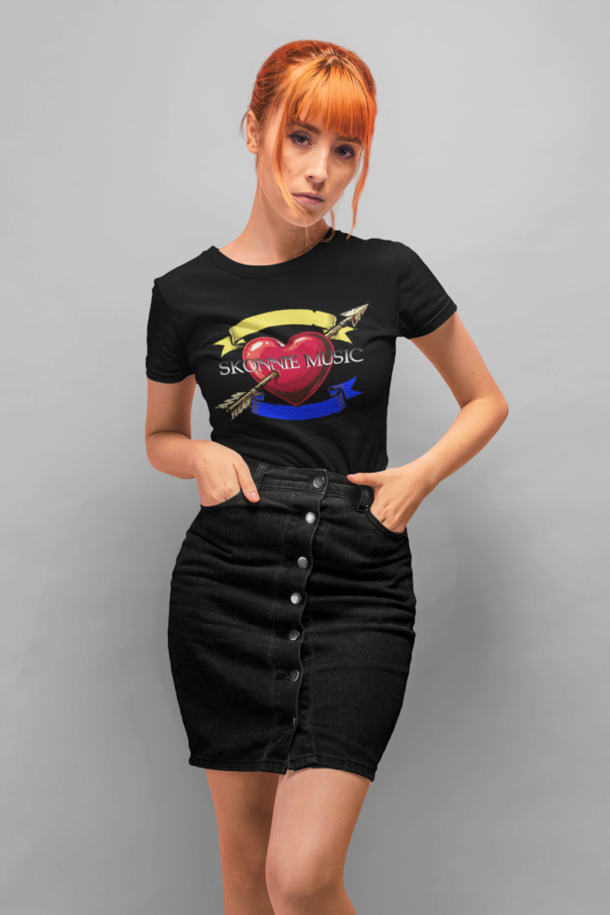 Classic women's short sleeve tee in black with new original art by Skonnie Music in honor of album Nuraghe. Perfect gifts for musicians, fans, and music lovers. Available in a variety of sizes and colors.