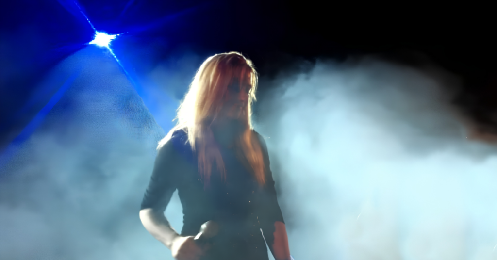 Connie Yerbic, vocalist and flutist of symphonic metal band Skonnie Music, performing live